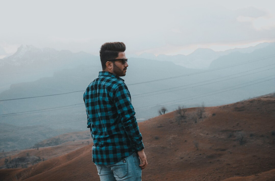 Portrait of a bearded man in casual shirt